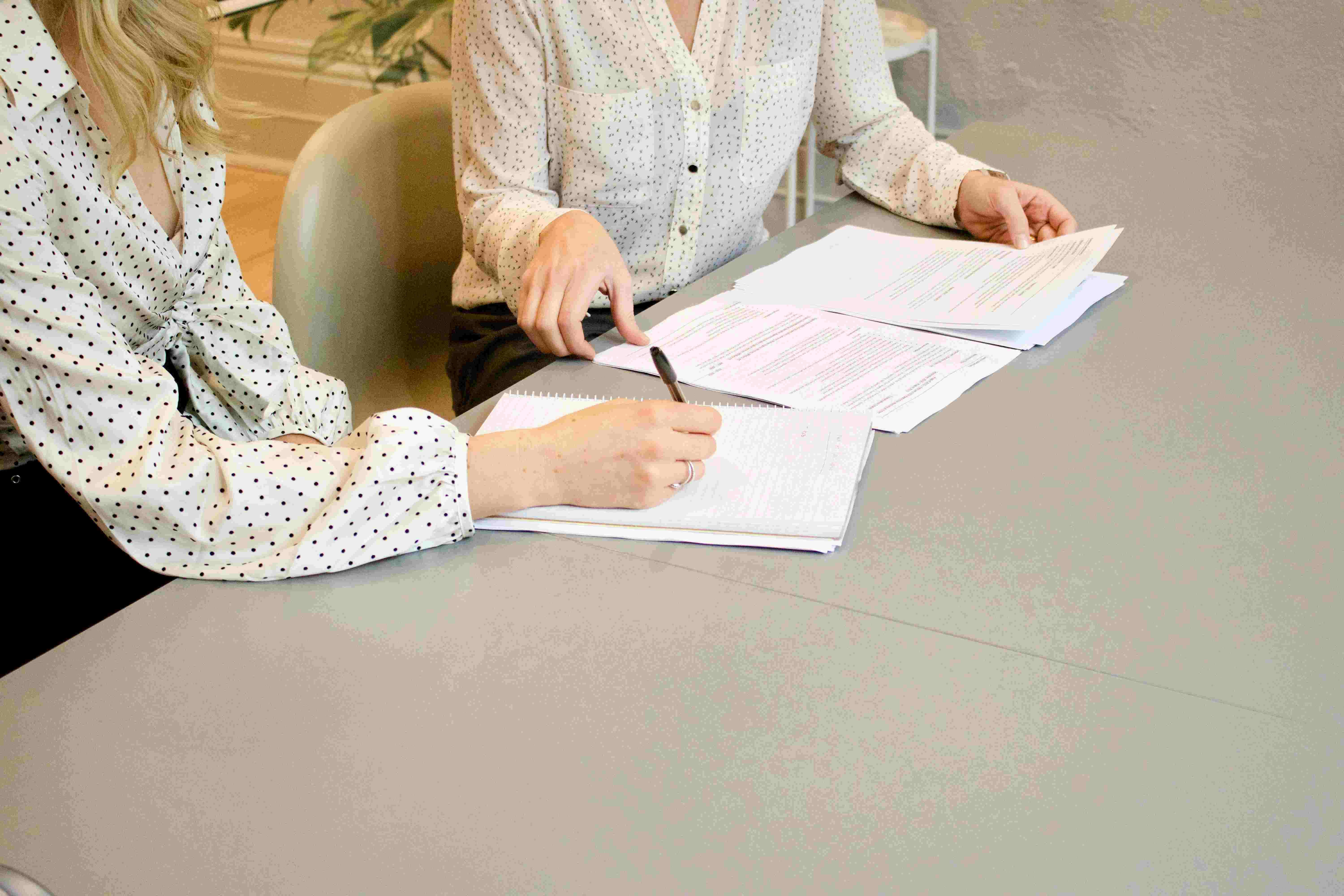 Taking notes during a client consultation